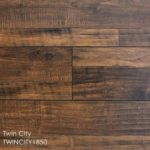 Horizen Flooring presents to you a picture of a 12mm Laminate flooring, manufactured by Knoas Flooring. Color: Twin City.