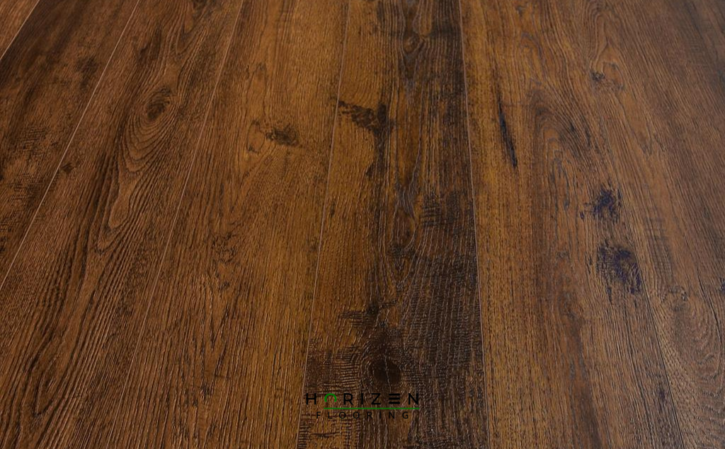 Horizen Flooring presents to you a picture of a quality wide plank Garnet Bay luxury vinyl plank. LW Flooring Riverstone collection features a wide range of colours & designs that will compliment any interior. Natural wood grain synchronised surface allow for an authentic hardwood look & feel. This collection features a 5.5 mm overall thickness and a durable 20 mil wear layer for residential and commercial applications.