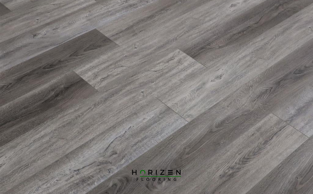 Horizen Flooring presents to you a picture of a quality wide plank Moonstone Creek luxury vinyl plank. LW Flooring Riverstone collection features a wide range of colours & designs that will compliment any interior. Natural wood grain synchronised surface allow for an authentic hardwood look & feel. This collection features a 5.5 mm overall thickness and a durable 20 mil wear layer for residential and commercial applications.
