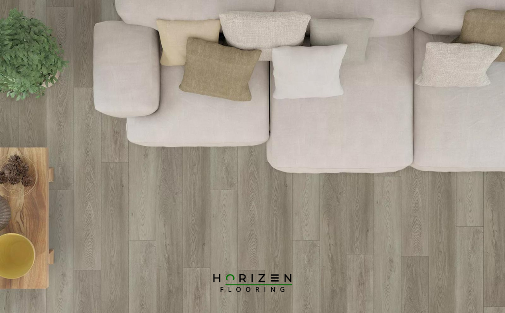 Horizen Flooring presents to you a picture of a quality wide plank Opal Stream luxury vinyl plank. LW Flooring Riverstone collection features a wide range of colours & designs that will compliment any interior. Natural wood grain synchronised surface allow for an authentic hardwood look & feel. This collection features a 5.5 mm overall thickness and a durable 20 mil wear layer for residential and commercial applications.