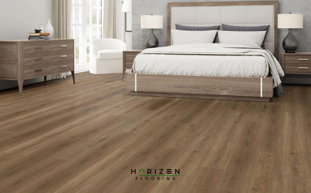Horizen Flooring presents to you a picture of a quality wide plank Peridot Drift luxury vinyl plank. LW Flooring Riverstone collection features a wide range of colours & designs that will compliment any interior. Natural wood grain synchronised surface allow for an authentic hardwood look & feel. This collection features a 5.5 mm overall thickness and a durable 20 mil wear layer for residential and commercial applications.